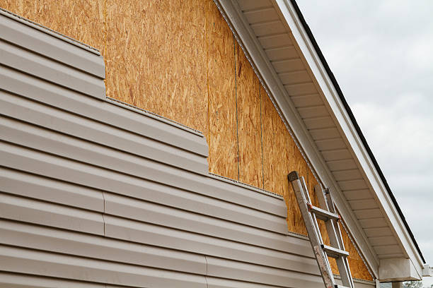 Professional Siding Installation technician working in North Fairfield, OH